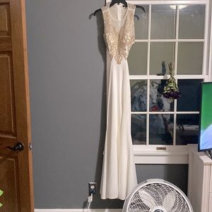 Gorgeous gold and white Prom dress worn once. Slit on the leg. Open back.